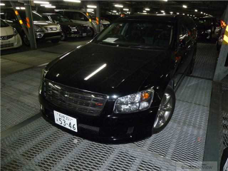 Illustration for article titled Why own a FWD economical and reliable diesel MT turbo 4 estate car with 214bhp when you can have this RWD V6 oil-hungry AT Stagea Autech Axis S with 286bhp?